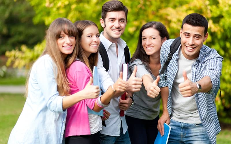 Group of students showing ok sign Group of students showing ok sign